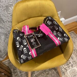 Betsey Johnson Black Skull Travel Bag with Pink Stripes